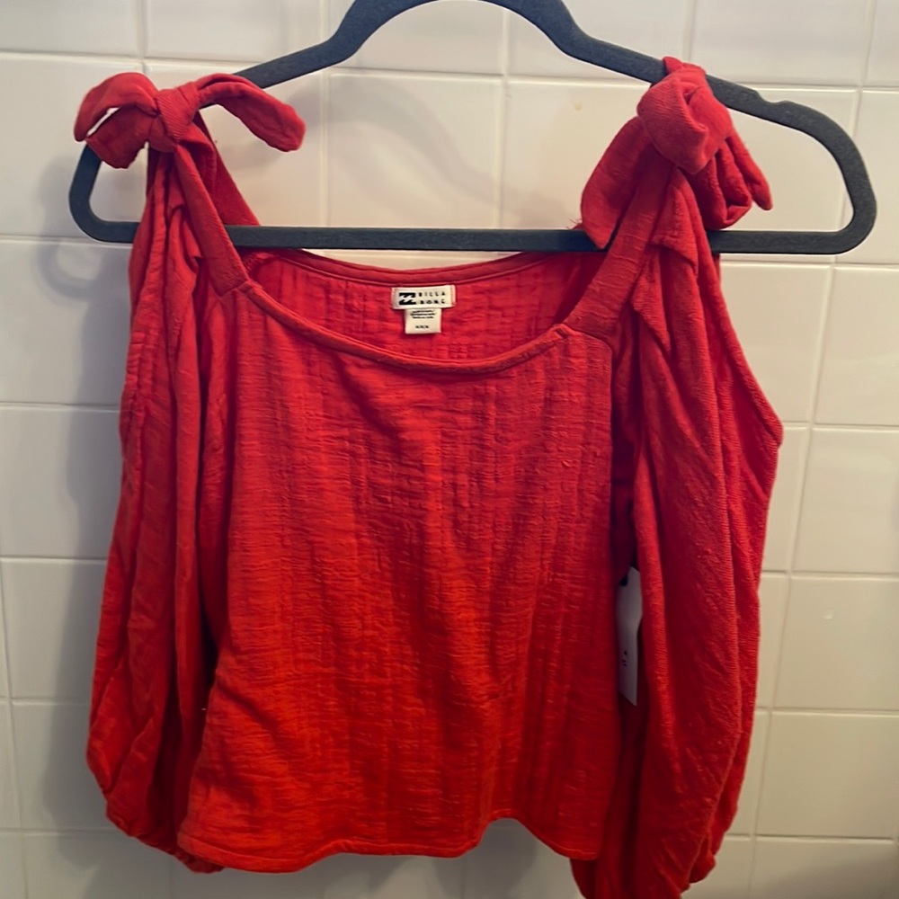 Billabong red long sleeve with shoulder cut outs and bows